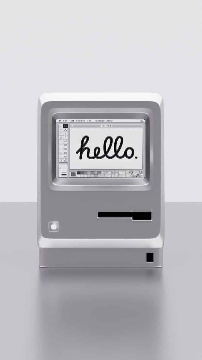 Image of old computer with text reading 'hello'